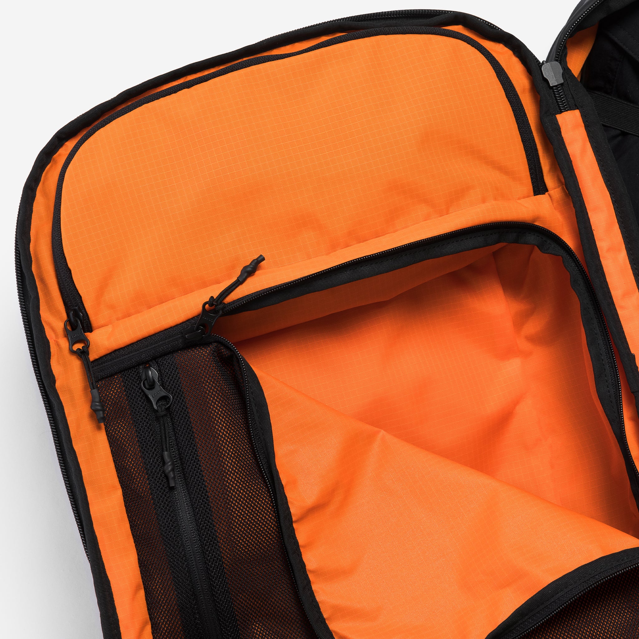 A studio shot of he interior of the Travel Backpack 40L in All Black